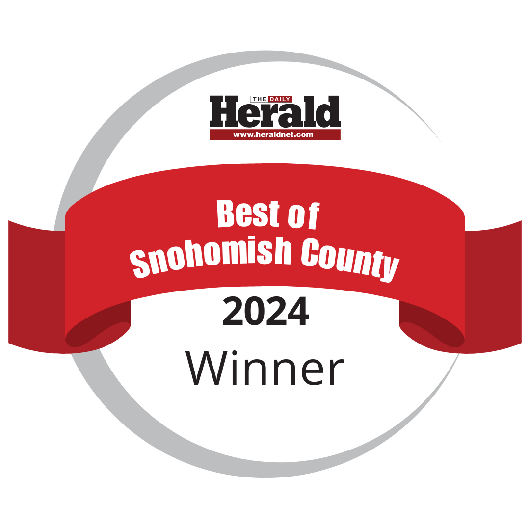 Red ribbon award with words The Herald Best of Snohomish County 2024 Winner