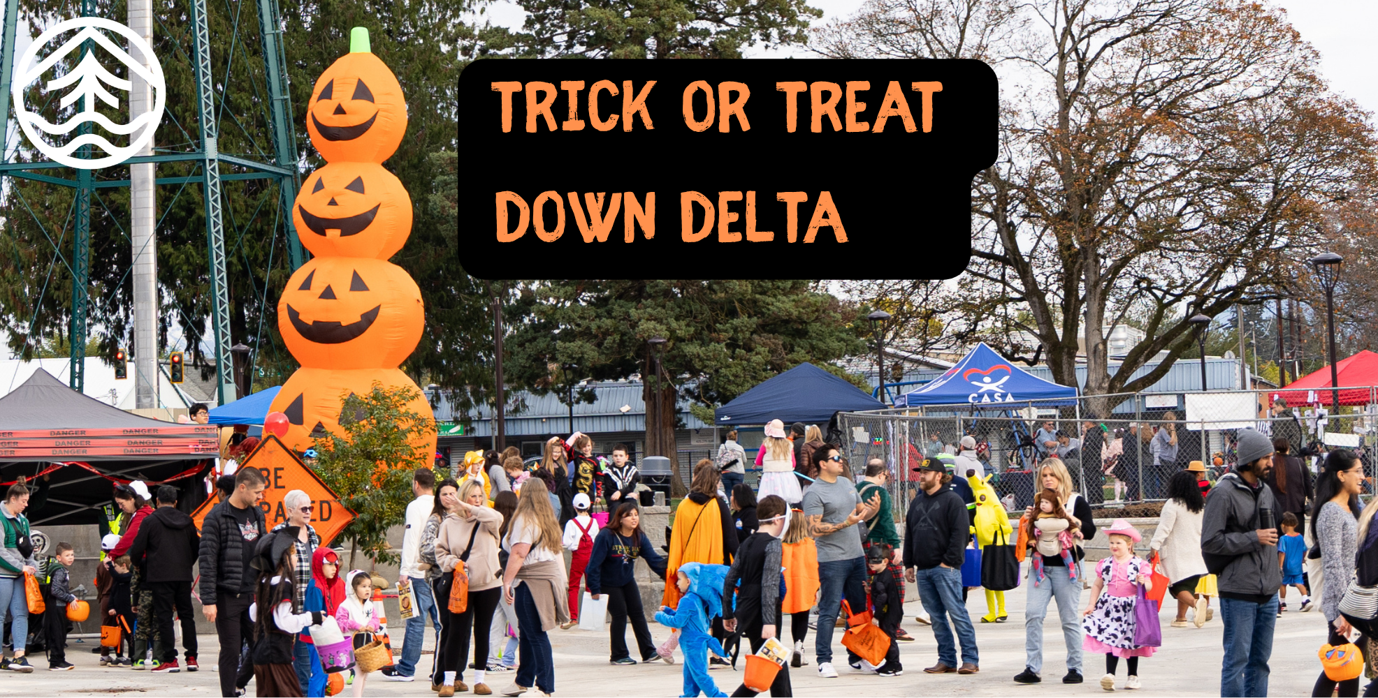 Families Trick or Treating in Comeford Park Plaza