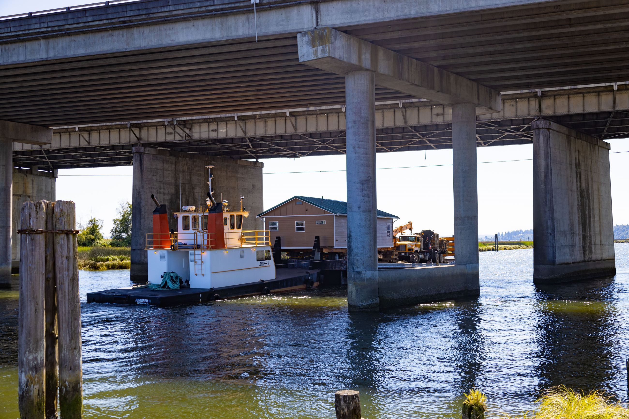 Marysville historic house on barge in water