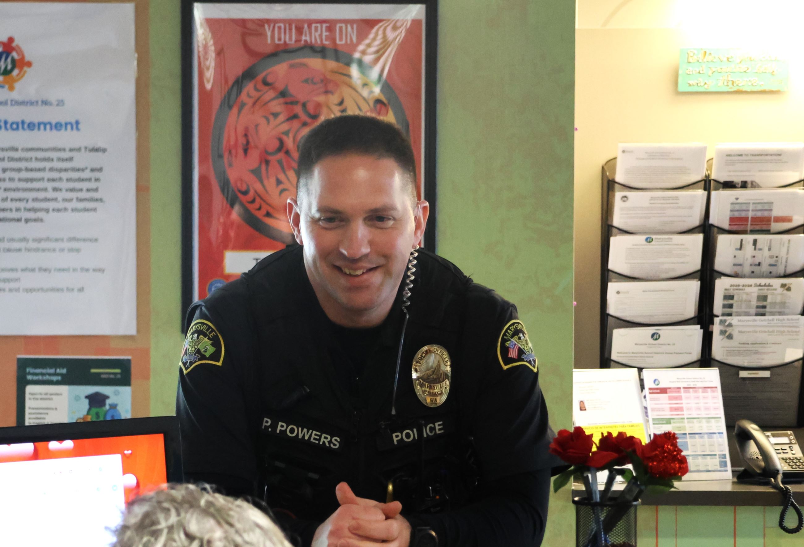 Officer Phil Powers with staff